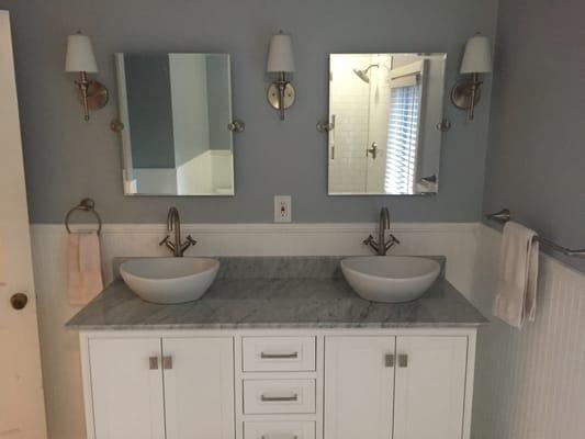 Decatur Master Bath vanity, bead board wainscot, marble counter top, floating wall mirrors, triple wall sconces