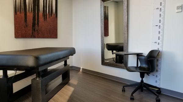 Form meets function with our luxurious medical treatment table and facial rejuvenation treatment room.