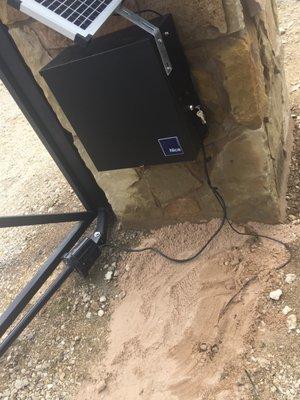 wires left hanging and exposed covered by sand....