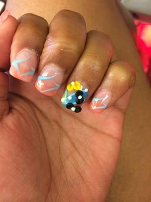 I think her name is Diane, I'm not sure, but she did my nails and their simply AMAZING! The 3D design was exactly what I wanted!