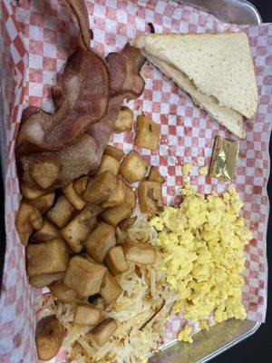 Breakfast platter.  Notice toast isn't toasted and I ordered hashbrowns. Sent it back as all food was cold.