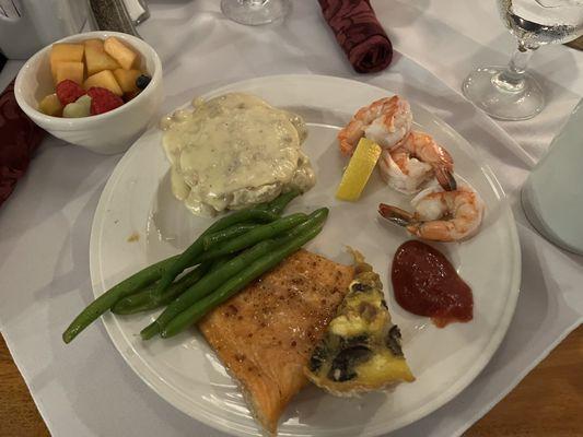 Fruit salad, Biscuit with sausage gravy, shrimp cocktail, mushroom quiche, salmon and green beans