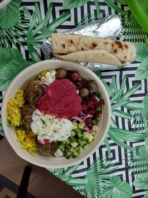 Chicken meatballs with rice, beet hummus, tzatzi and more