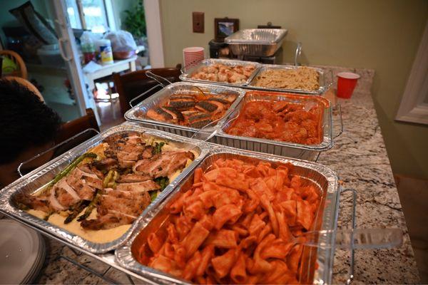 Top row - right to left: Roasted Chicken Salmon Trapanese Knots/dipping dough Bottom row: Marinara Rigatoni meatballs Spaghetti Aglio Olio