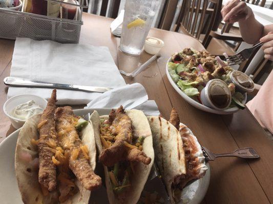 Fried fish tacos and grilled chicken salad.