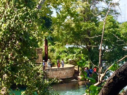 A view of Lou Neff point from the south side of Lady Bird Lake..