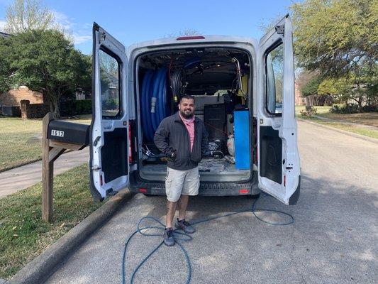 Owner of C3 Carpet Cleaning, Mr. Henry Godoy outside is Company Van.  Impressed how neat and organized it was.