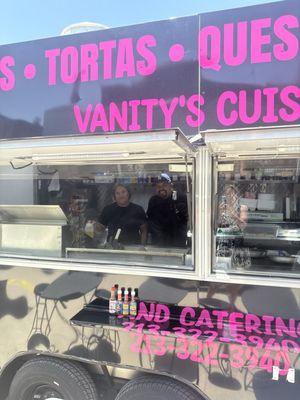 This is their food truck, and those are the owners