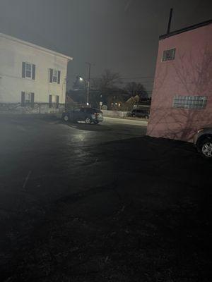 Dark parking lot.