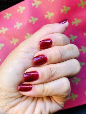 Sparkly burgundy gel manicure by Jaden