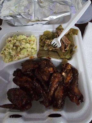 Smoked wings, green beans w/ turkey and coleslaw.