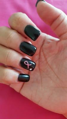 Loving my nails.   Black for Halloween and pink breast cancer sign.  Thanks Kim!