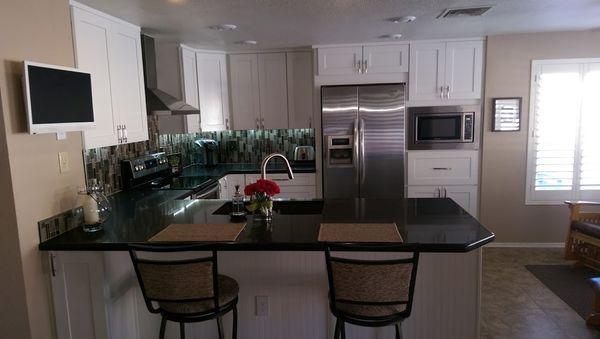 I used Avonti's cabinets and black granite countertops for this kitchen remodel.