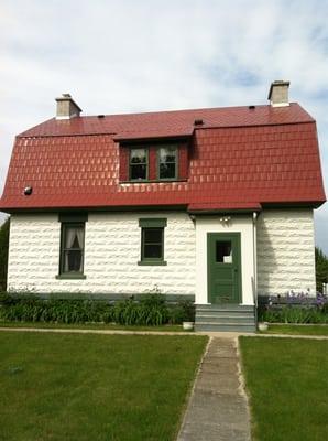 Newer lighthouse keeper house.  You can take a free tour; it's quite nice.