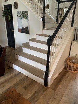 Vinyl wood floors and manufactured wood on stairs!