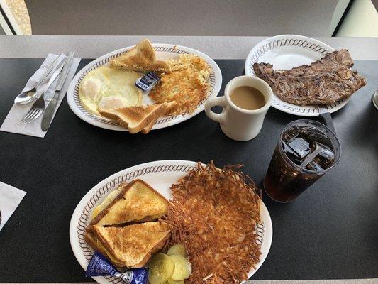 Steak and eggs with hashbrowns scattered/Texas toast bacon egg and cheese sandwich with hashbrowns well done. Coffee and Soda.