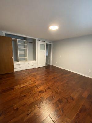 The new flooring in the master bedroom.