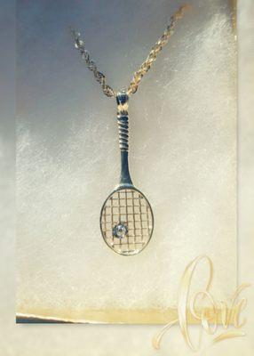 Tennis pendant had a broken pinch bail, replaced and added it to a new necklace.