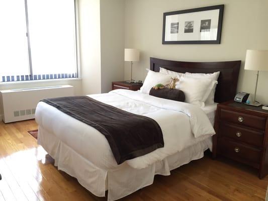 Queen bed with spacious closets.