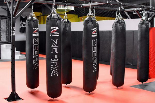 Our Muay Thai bags on the MMA side. We have 8 on this side and 2 on the Traditional side.