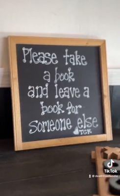 Sign on the book shelf