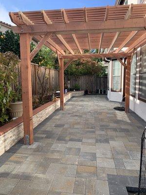 Love the pergola, pavers and retaining wall. We have so much usable space for this small yard and looks gorgeous.