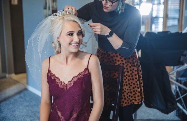 Taylor is my regular stylist, but this is her finishing up my wedding hair