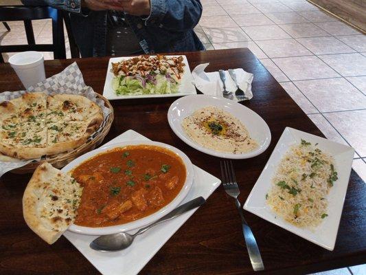 Butter Chicken was spot on delicious!!! Chicken over rice with naan bread and hummus. Perfect. I never knew this place was here.