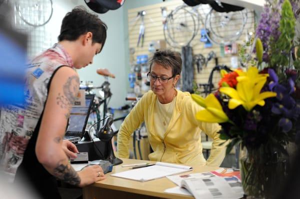 Rose ringing up a customer at the Grand Opening.