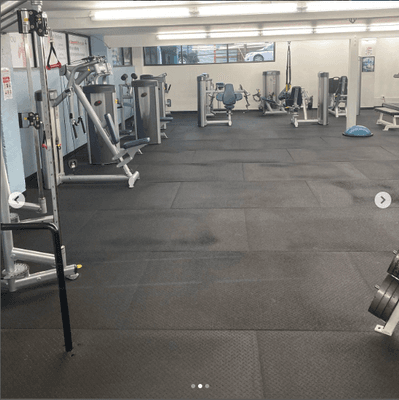 Resistance machines and cable columns on bottom floor.