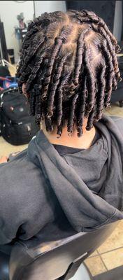 Comb coils on curly hair