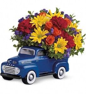 Gentleman like flowers too. Our Teleflora Ford Truck or Jeep containers are a prefect collector piece.