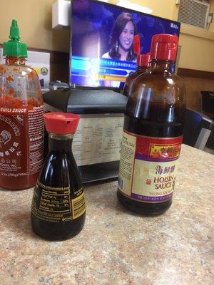 Hoisin, soy and siracha sauces.