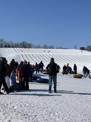 People standing around in chute path