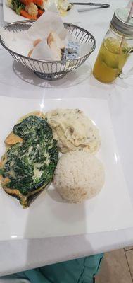 Salmon with sautéed spinach & coconut sauce.