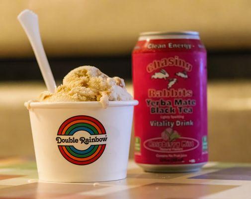 Large cup of banana pudding ice cream and a soft drink.