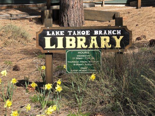 Tuesday, May 7, 2019: library sign with hours.