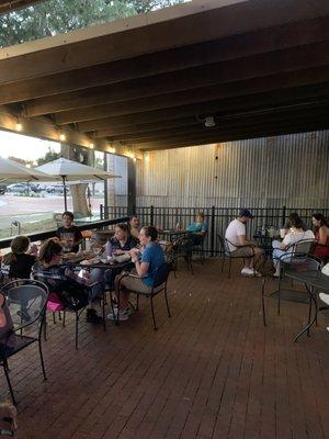 Outdoor dining terrace on porch of eatery