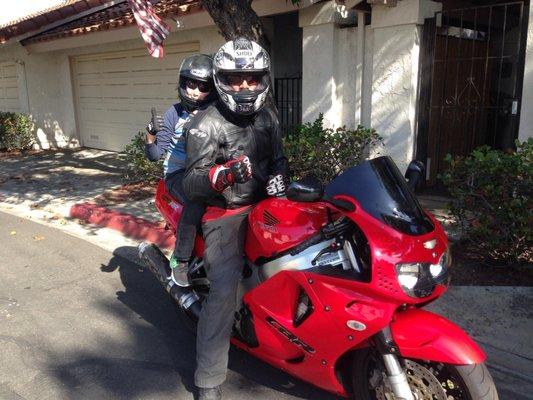 Taking the step-son out for a ride on my recently tuned (almost) classic '96 Honda 900rr.  Thanks Darren!