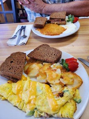 Western omelette, eggs over with hashbrowns and sausage links