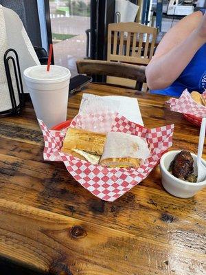 Cuban Sandwich w/ sausage, side of potatoes and plantains. Sort of pictures in back is Italian sandwich and iced cafe con leche