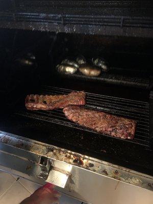 Bringing up the ribs in the smoker...taste as good as they look!