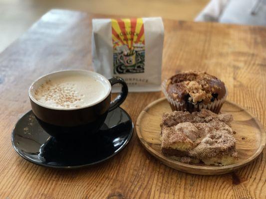 Chai tea, coffee cake, blueberry muffin, and some to go coffee beans