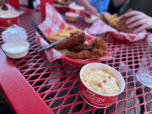 Hot chicken tenders with fries and Mac and cheese