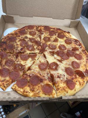 Large pepperoni pizza.