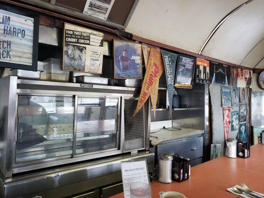 Some old memorabilia that lines the walls all around the front dining car.