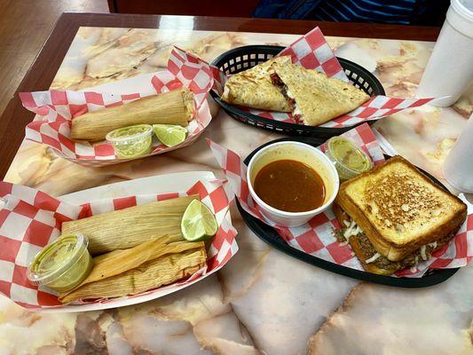 The whole order...on the left are three tamales (two chicken, one pork), all great.