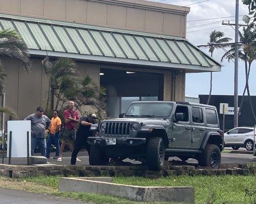 Oops. Car wash closed while they get this clown off the median!