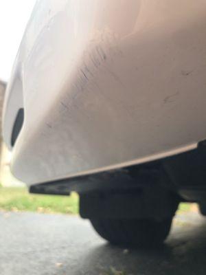 The repair completed by Combs Collision, to the damaged bumper cover, caused by the accident.