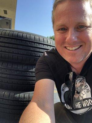 Me with new tires ready to go on cars.